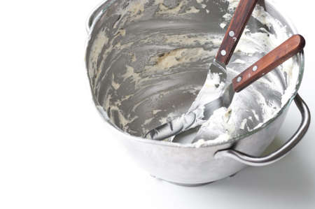 Dirty stainless steel mixing bowlの写真素材