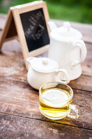 Lemon tea on grunge wooden backgroundの写真素材