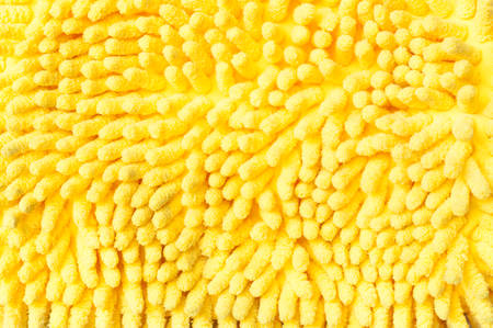 Yellow car cleaning gloveの写真素材