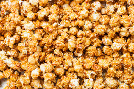 Caramel popcorn texture backgroundの写真素材