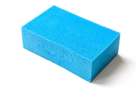 blue sponge isolated on white backgroundの写真素材