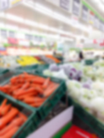 Mixed fruits and vegetables at organic fairの写真素材