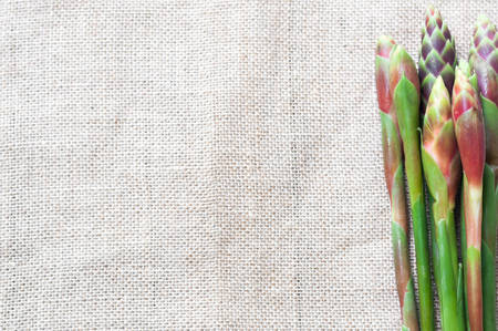 Siam Tulip (Cucuma Sparganifolia) , fresh vegetable on burlap backgroundの写真素材