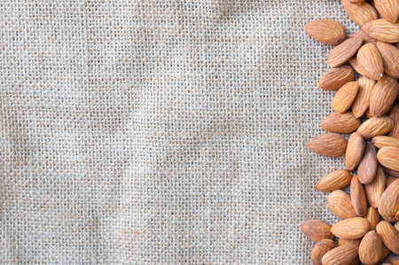 Almond on burlap backgroundの写真素材