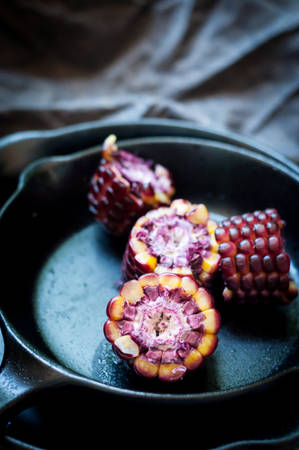 Ruby corn in iron panの写真素材