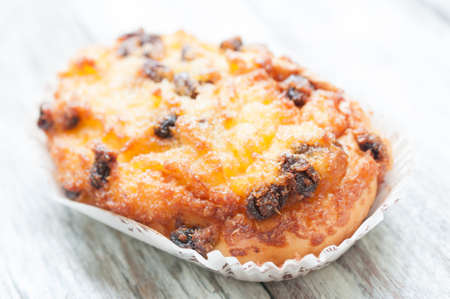raisin and coconut bread with tea and teapotの写真素材