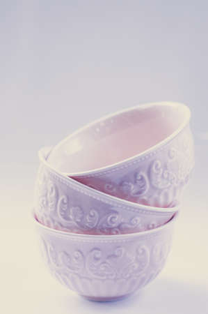 ceramic bowls stacked on whiteの写真素材