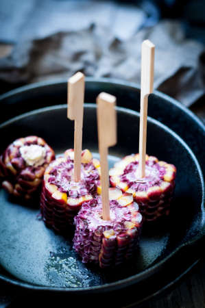 Ruby corn in iron panの写真素材