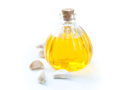 Bottle of olive oil and garlicの写真素材