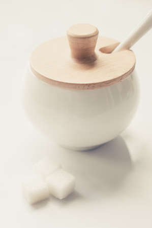 sugar cubes in a bowl in pastel toneの写真素材