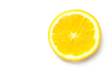 Slice of orange fruit isolated on white backgroundの写真素材