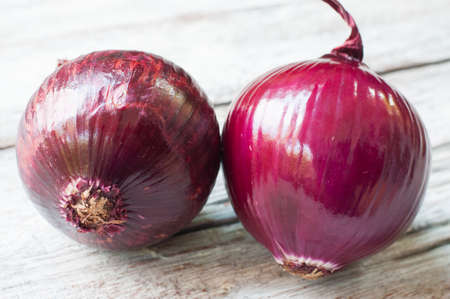 India shallot on wooden backgroundの写真素材