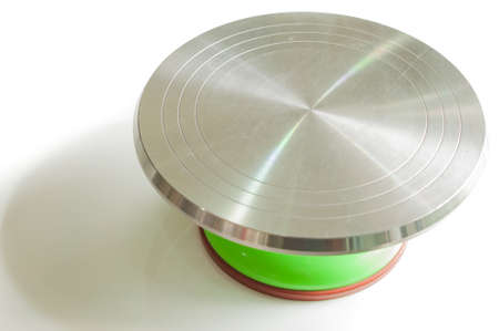 cake stand or rotating cake stand on white backgroundの写真素材