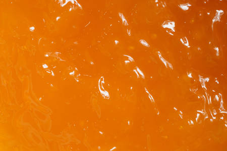 Orange jam texture backgroundの写真素材