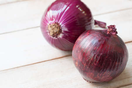 India shallot on wooden backgroundの写真素材