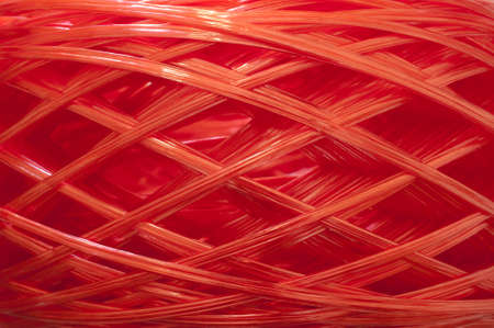 Red plastic rope texture backgroundの写真素材