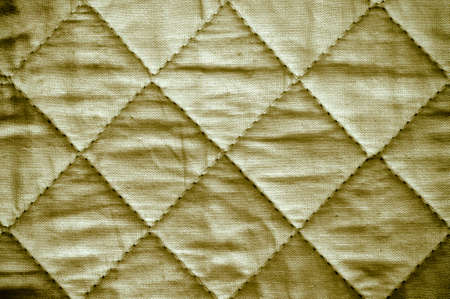 Old brown checkered pattern fabric background