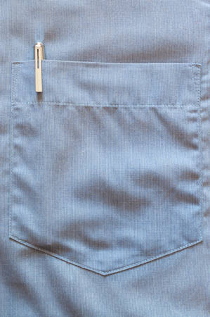 pen in a blue shirt pocket, business concept