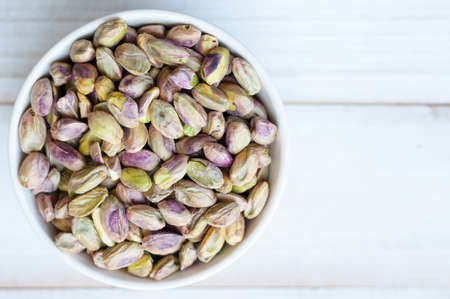 pistachios in ramekin bowlの写真素材