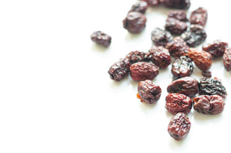 Dry red jujube isolated on white backgroundの写真素材