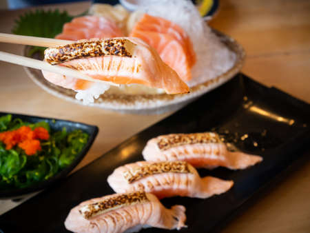 Salmon grilled with cheese sushiの写真素材