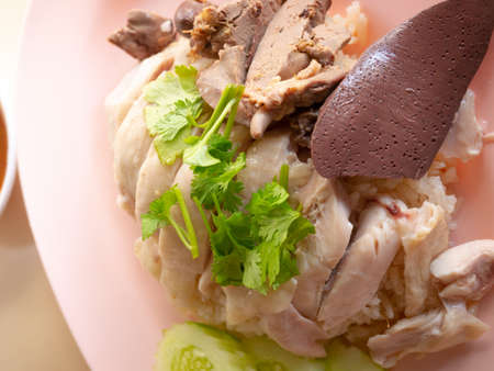 Hainanese chicken rice on pink dishの写真素材