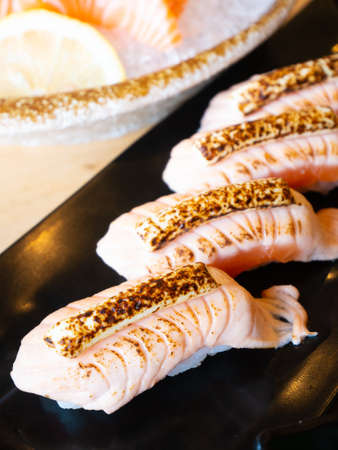 Salmon grilled with cheese sushiの写真素材