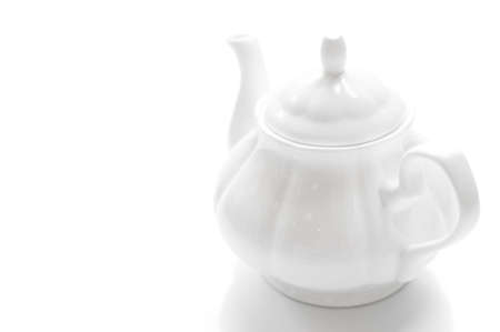 White ceramic teapot isolated on white backgroundの写真素材