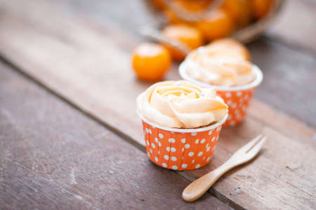 orange butter cream cakeの写真素材