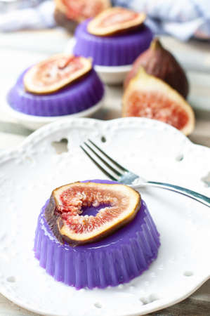 Figs pannacotta on white dishの写真素材
