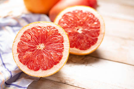 Grapefruit  on wooden backgroundの写真素材
