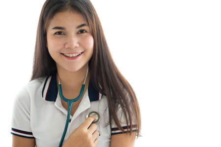 Doctor using stethoscope to checking herselfの写真素材