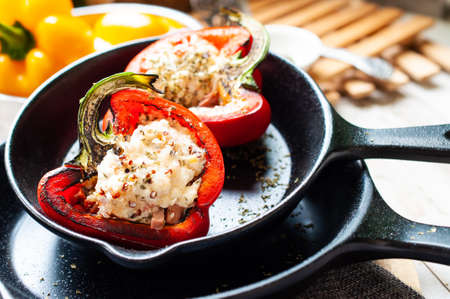Sweet pepper stuffed with chicken, cheese and quinoaの写真素材