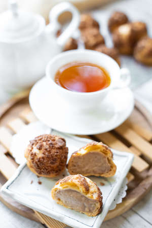 Craquelin Choux Buns with chocolateの写真素材