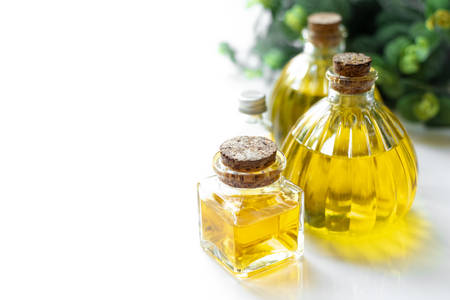 Eucalyptus oil on wooden  boardの写真素材