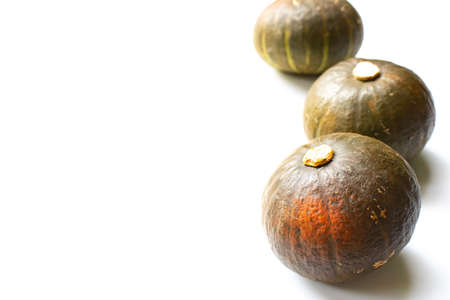 Japanese pumpkin isolated on whiteの写真素材