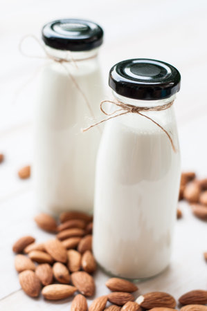 Almond milk with almondの写真素材