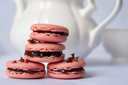 Pink macaroons on a white background. copy spaceの写真素材