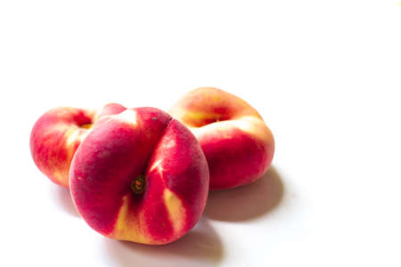 Peach Donut isolated on white backgroundの写真素材