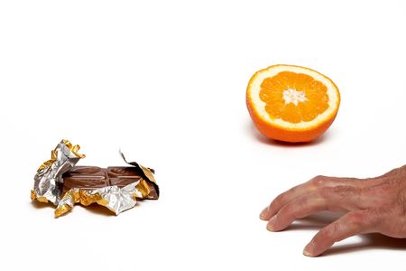 What to choose? Chocolate or orange. Saparate on white.の写真素材