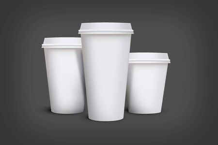 White blank takeaway paper, carton or cardboard coffee cup in different size on isolated white background, including clipping path for cutout. Empty tea mockup for presentation on isolated background.の写真素材
