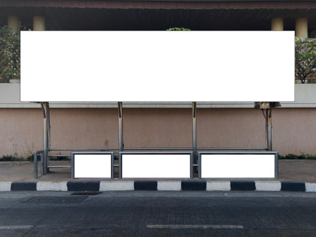 A front view of bus stop in Mumbai, India with blank empty place for commercial banner mockup billboard, ooh, outdoor. Indian bus stop mock-up for branding. A complete bus mockupの写真素材