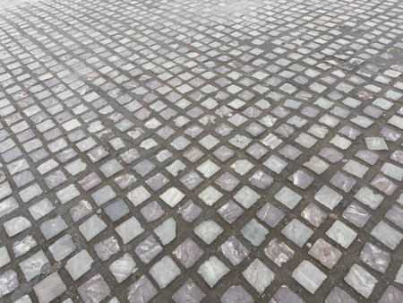 Cobblestone tiles on walkway street, square tile pattern in perspectiveの写真素材