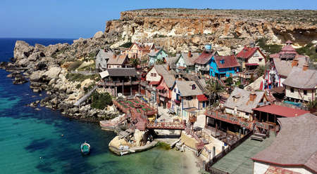 ANCHOR BAY, MALTA - Mart 23, 2015: Famous Popeye village with colorful housesのeditorial素材