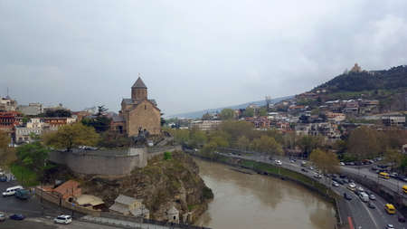 Tbilisi, Georgia - April 13, 2016: Metekhi St. Virgin Church and King Gorgasali Statue over Kura river, Tbilisi, Georgiaのeditorial素材