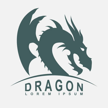 Dragon head with a wing silhouette - business emblem. Vectorのイラスト素材