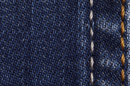 Blue jeans Texture with the stitched seam, jeans textile close upの写真素材