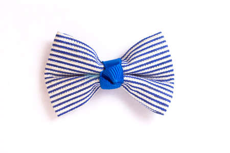 Tied festive bow isolated on white backgroundの写真素材