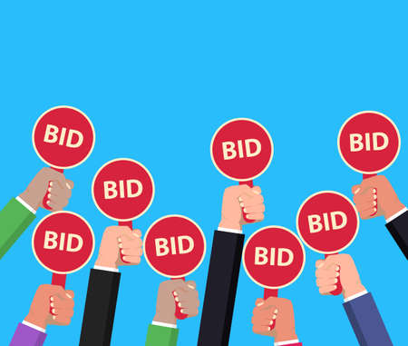 Hands holding auction paddle
