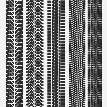 Traces of tires, tire track set, tread marks silhouette, vertical seamless pattern for machine and vehicle wheel print.のイラスト素材